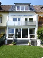Reihenhaus mit verglaster Südseite und Gauben